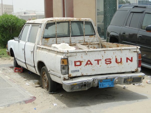 Rusted Datsun pickup on a Riyadh street in 2009, the everyday reality that counters Saudi Arabia misconceptions